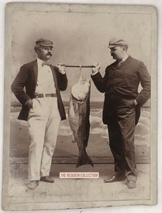 Cabinet Card featuring Two Men Holding a Large Fish